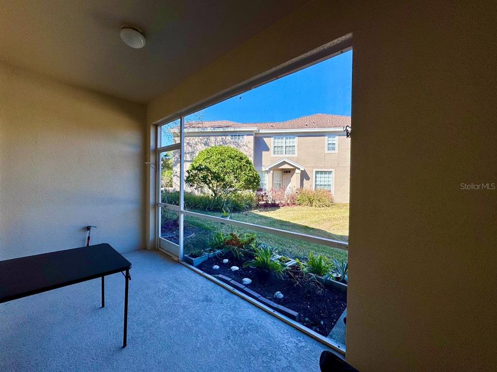 10035 Tranquility Way Tampa, FL 33625 - Photo 25 of 28 a room with toys and flowers