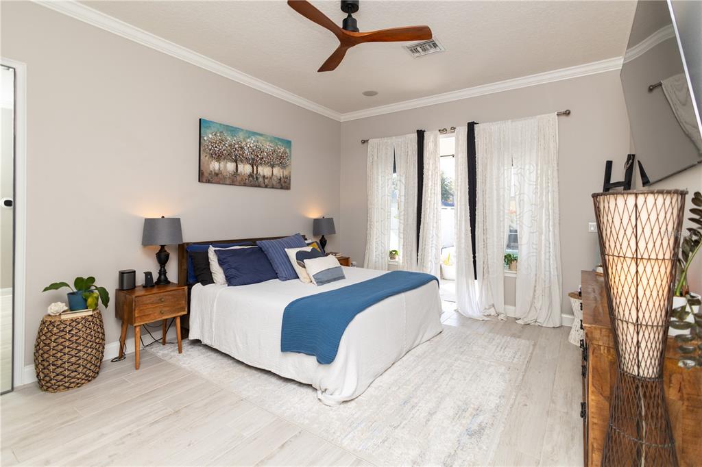 3305 Schoolhouse Road St. Cloud, FL 34773 - Photo 25 of 83 a bedroom with bed and a window