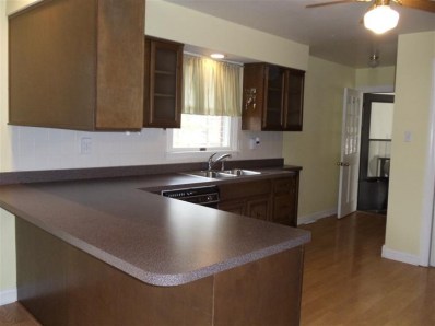 95 West Division Road Valparaiso, IN 46385 - Photo 6 of 10 a kitchen with a sink and a refrigerator