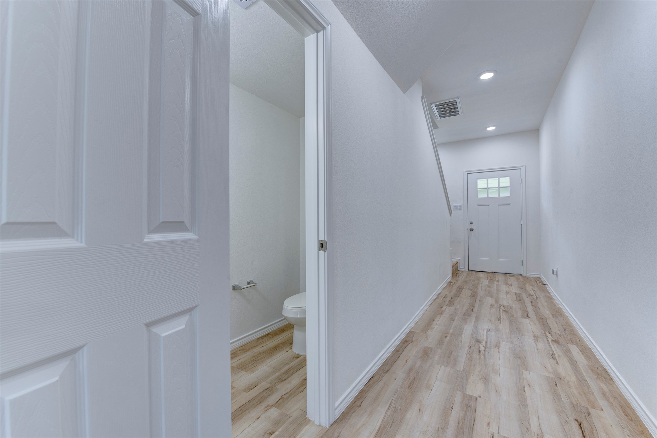 8203 Woodlyn Road, Unit F Houston, TX 77028 - Photo 3 of 29 a view of wooden floor