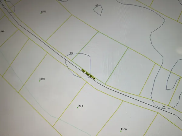 a view of a refrigerator in kitchen