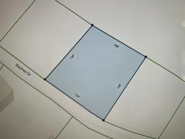 a close up of a shower and a shower curtain