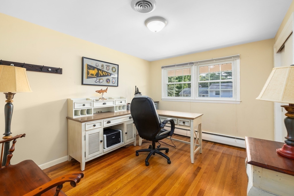 98 Sheffield Road Cranston, RI 02920 - Photo 11 of 23 a view of a workspace with furniture and a window