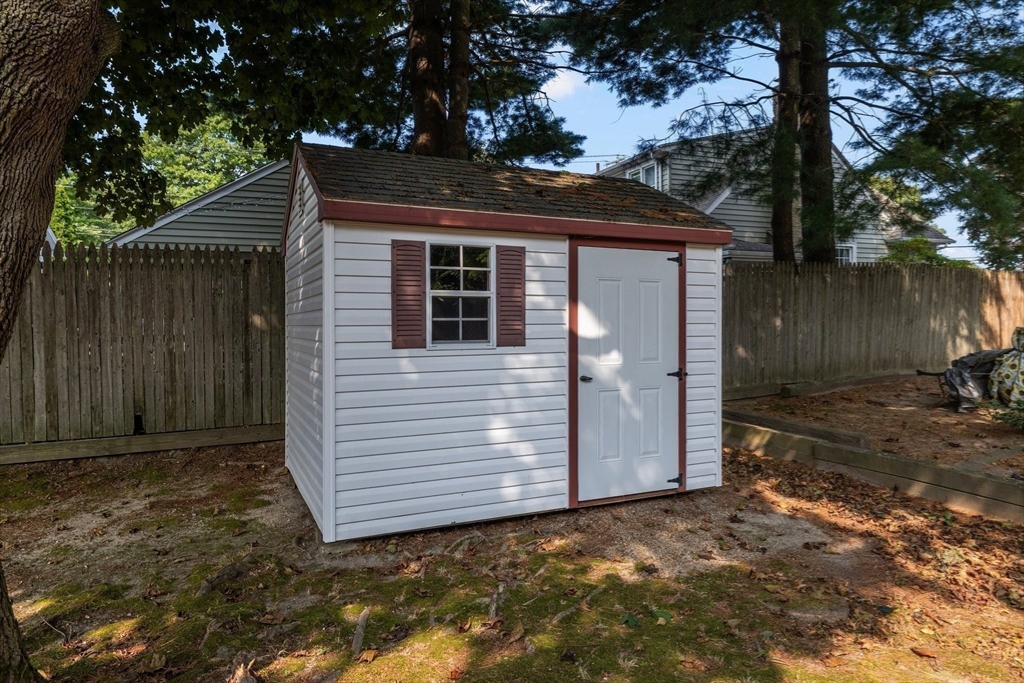 98 Sheffield Road Cranston, RI 02920 - Photo 21 of 23 a backyard of a house