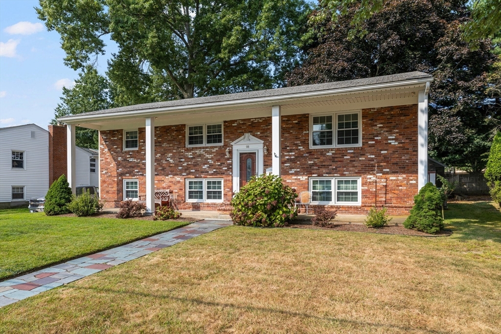 98 Sheffield Road Cranston, RI 02920 - Photo 23 of 23 a front view of a house with garden