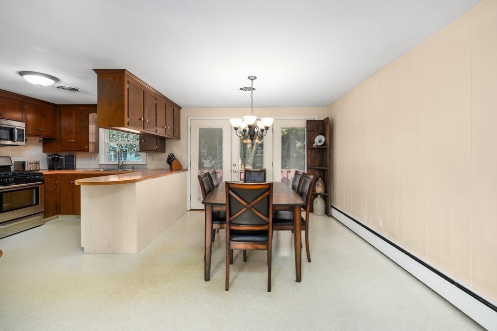 98 Sheffield Road Cranston, RI 02920 - Photo 5 of 23 a view of a dining room with furniture