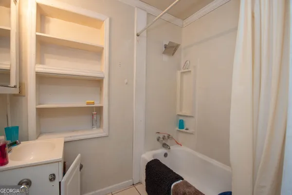 a bathroom with a sink and a bathtub