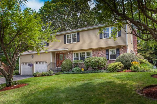 39 Circle Road Lexington, MA 02420 - Photo 1 of 24 a front view of house with yard and green space