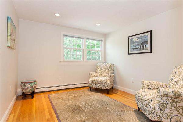 39 Circle Road Lexington, MA 02420 - Photo 18 of 24 a bedroom with a bed and a couch