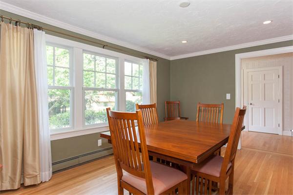39 Circle Road Lexington, MA 02420 - Photo 4 of 24 a view of a dining room with furniture and wooden floor
