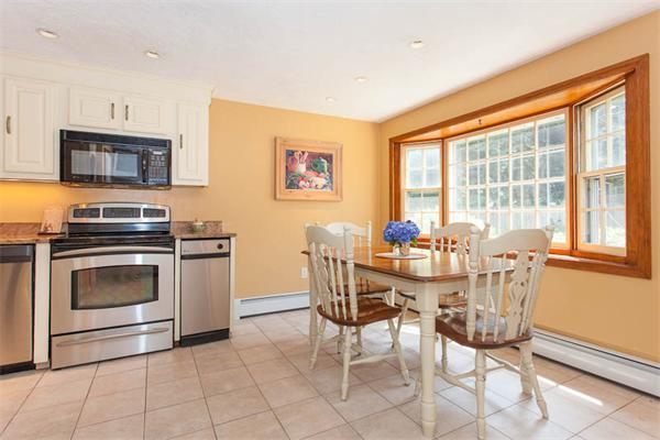 39 Circle Road Lexington, MA 02420 - Photo 5 of 24 a view of a kitchen with a stove top oven