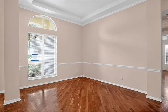 a bathroom with a granite countertop sink toilet mirror and shower