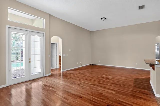 an aerial view of a house with outdoor space