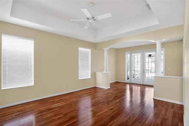 a kitchen with stainless steel appliances granite countertop a stove refrigerator and cabinets