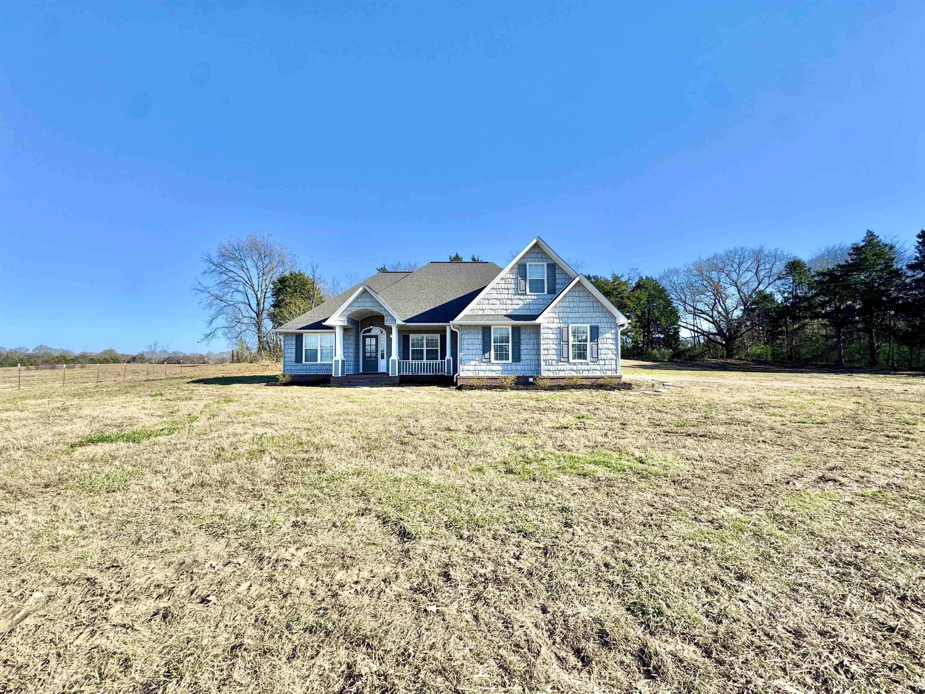 788 Bruce Road Whiteville, TN 38075 - Photo 2 of 39 View of front of house featuring a front lawn