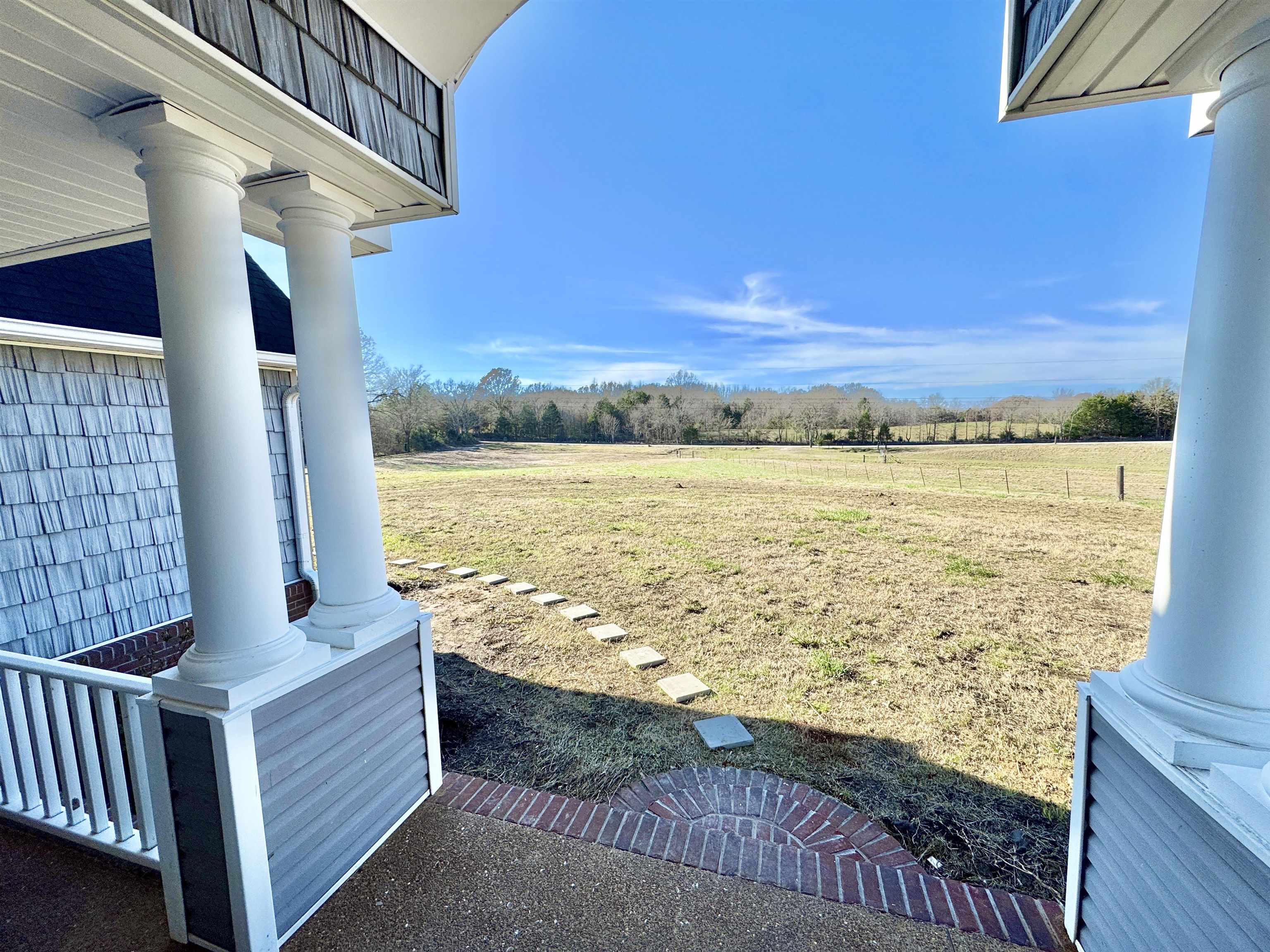 788 Bruce Road Whiteville, TN 38075 - Photo 5 of 39 View of grassy yard featuring a view of countryside
