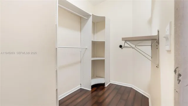 a view of front door with wooden floor