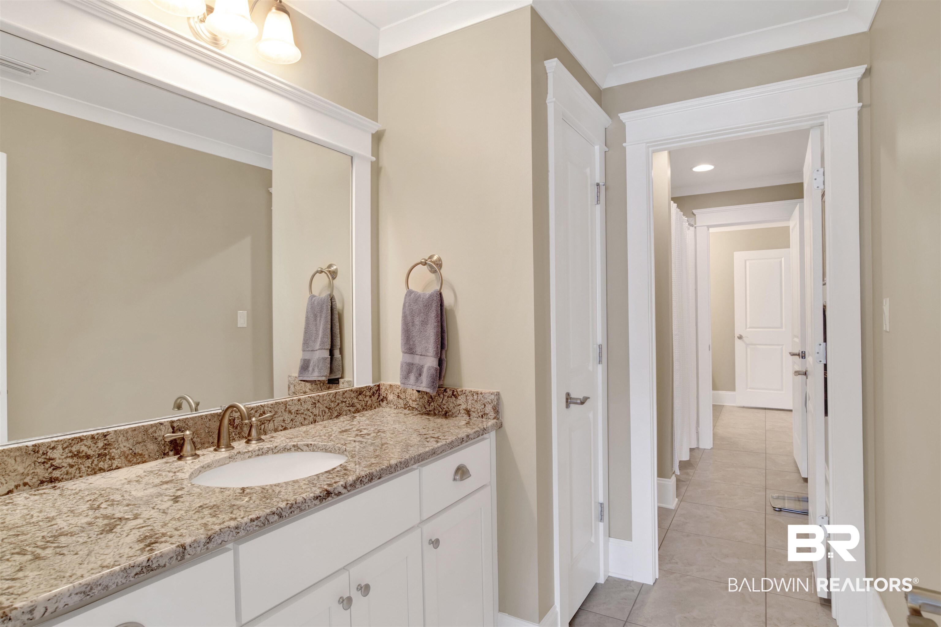 131 Sedgefield Avenue Fairhope, AL 36532 - Photo 32 of 50 3rd bathroom with ornamental molding, vanity, and tile patterned flooring