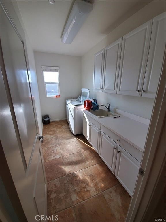 10926 Playa Del Sol Riverside, CA 92503 - Photo 14 of 18 Washer Dryer Area