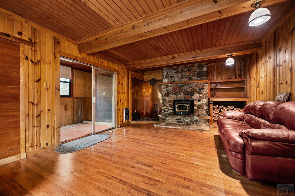 9600 Middle Creek Canyon Road Beulah, CO 81023 - Photo 10 of 50 a view of a livingroom with furniture and staircase