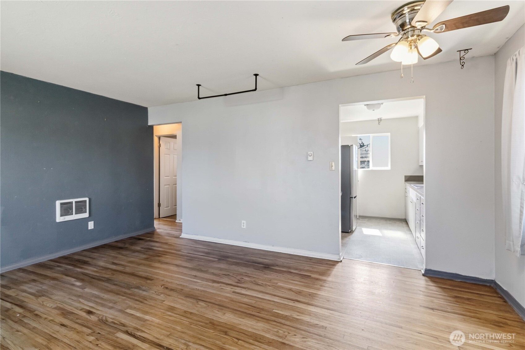 356 28th Avenue Longview, WA 98632 - Photo 6 of 24 a view of an empty room with wooden floor