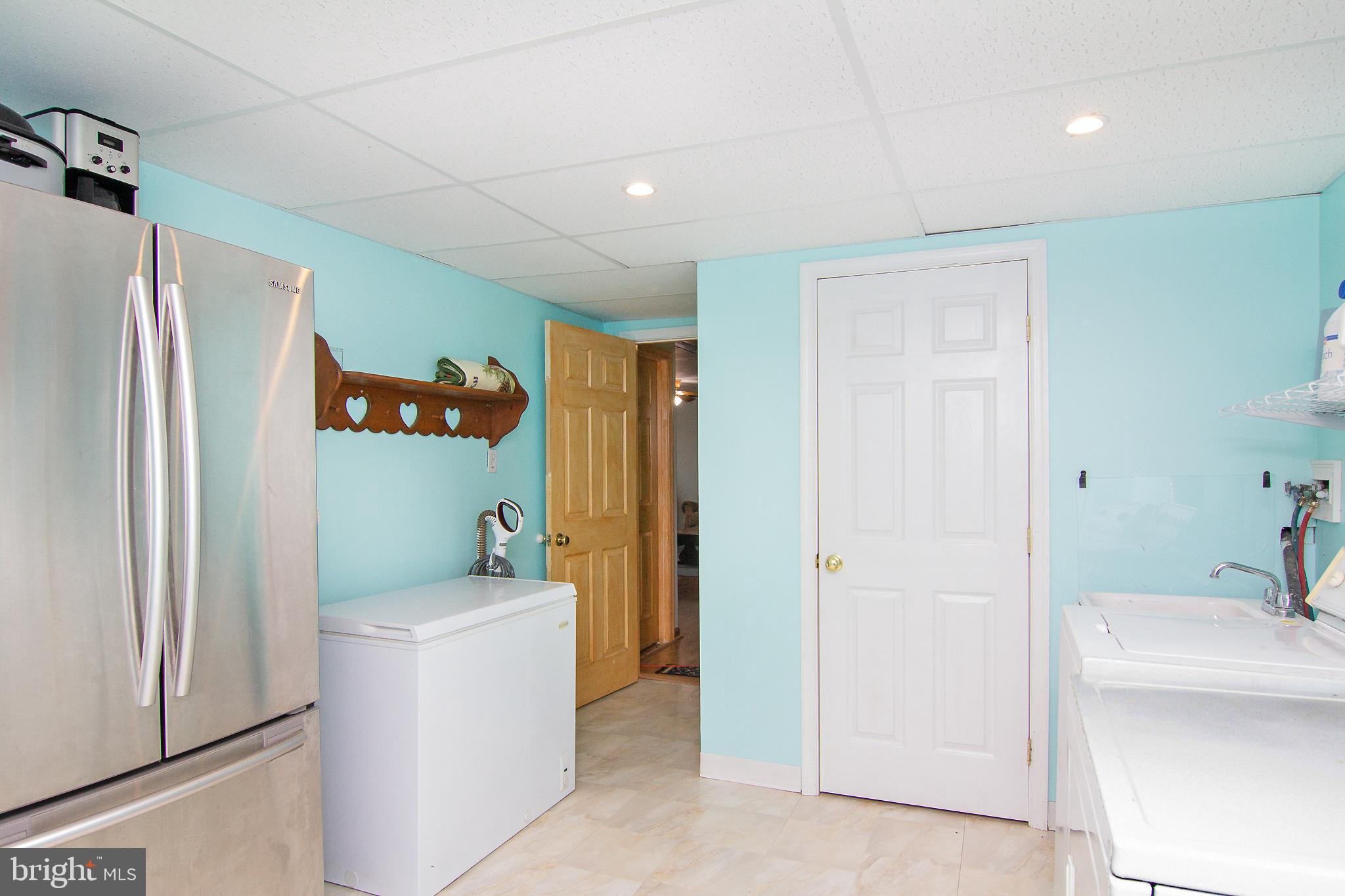 8124 Conduit Road Baltimore, MD 21234 - Photo 26 of 30 LARGE SPACIOUS LAUNDRY ROOM