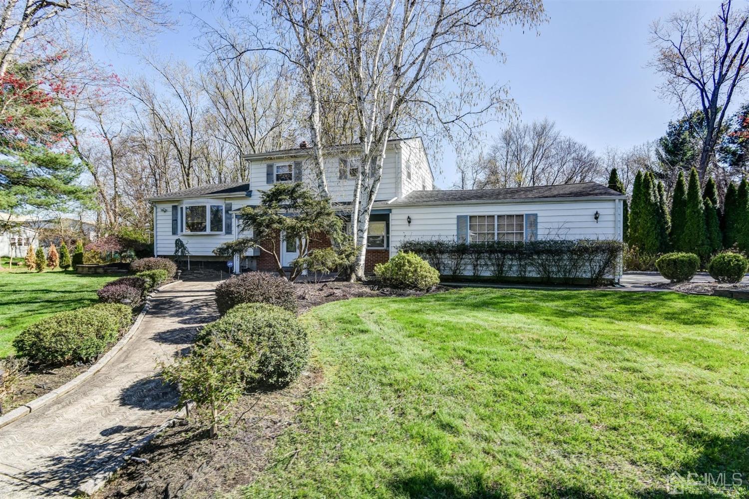 8 Innes Road East Brunswick, NJ 08816 - Photo 3 of 32 a view of a house with backyard and sitting area