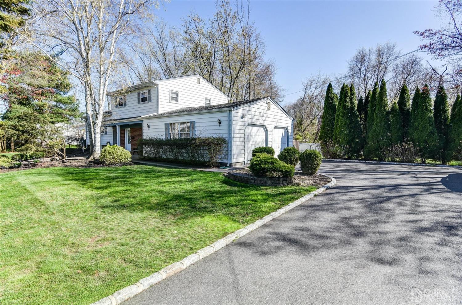 8 Innes Road East Brunswick, NJ 08816 - Photo 4 of 32 a front view of house with yard and green space