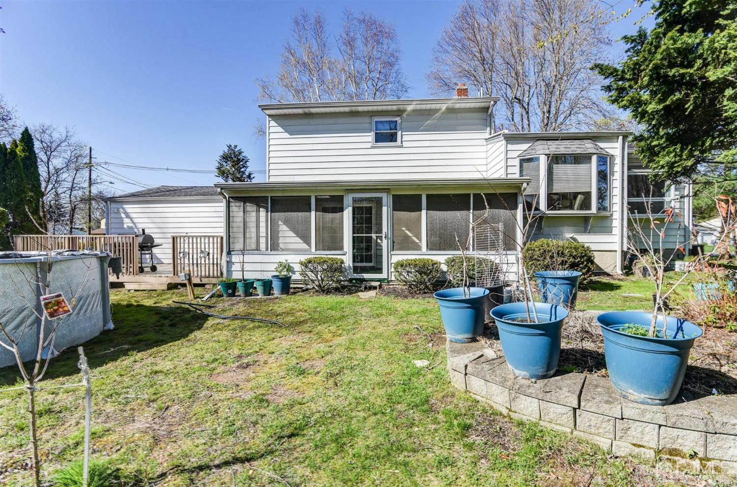 8 Innes Road East Brunswick, NJ 08816 - Photo 32 of 32 a view of a house that has a patio