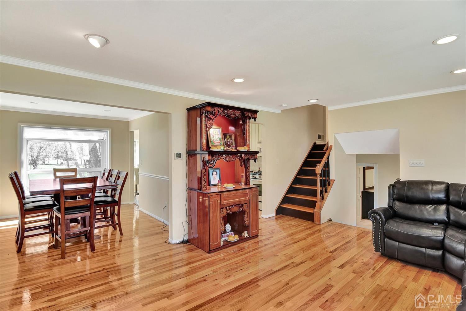 8 Innes Road East Brunswick, NJ 08816 - Photo 7 of 32 a dining room with furniture and wooden floor
