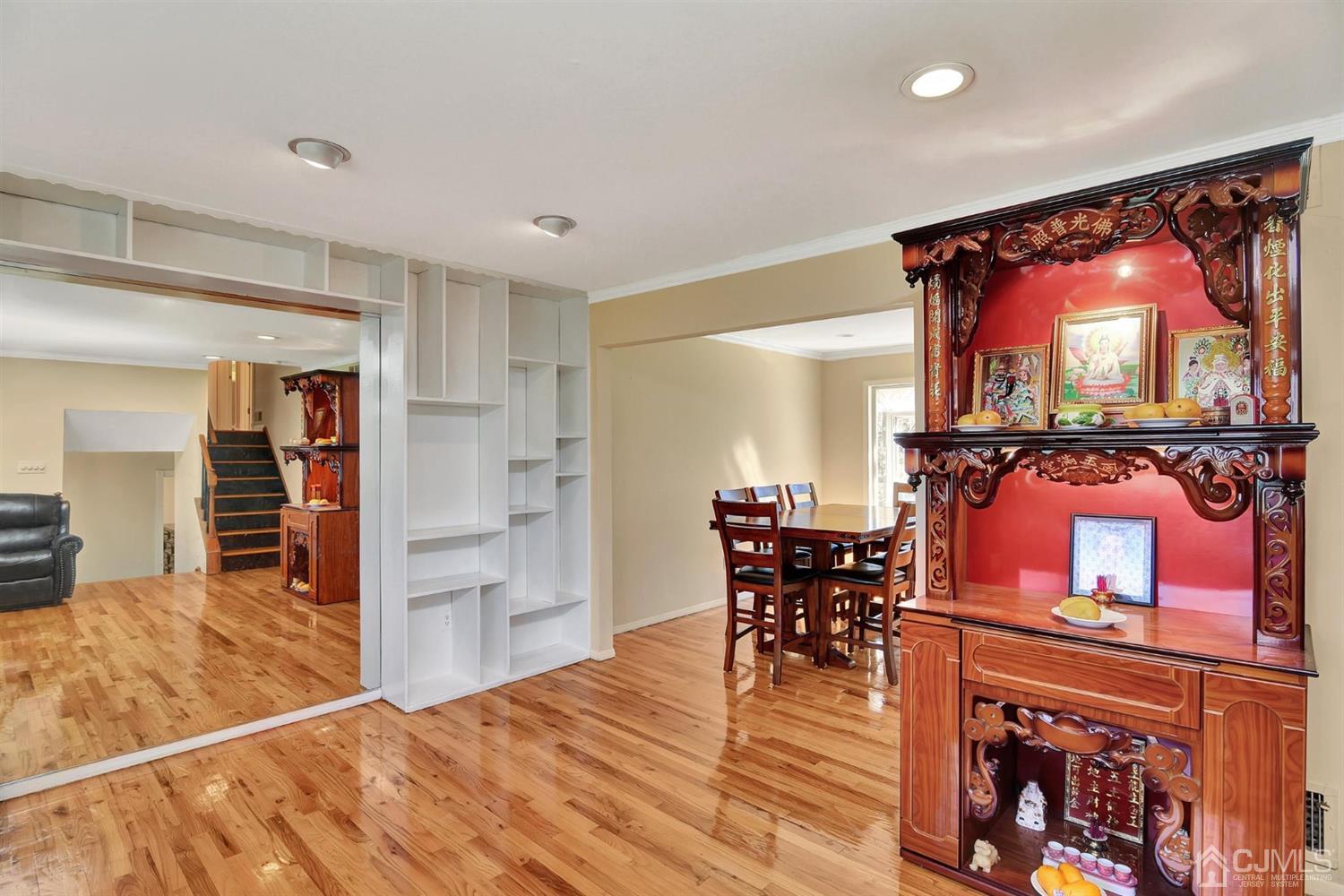 8 Innes Road East Brunswick, NJ 08816 - Photo 8 of 32 a view of a livingroom with furniture and a flat screen tv
