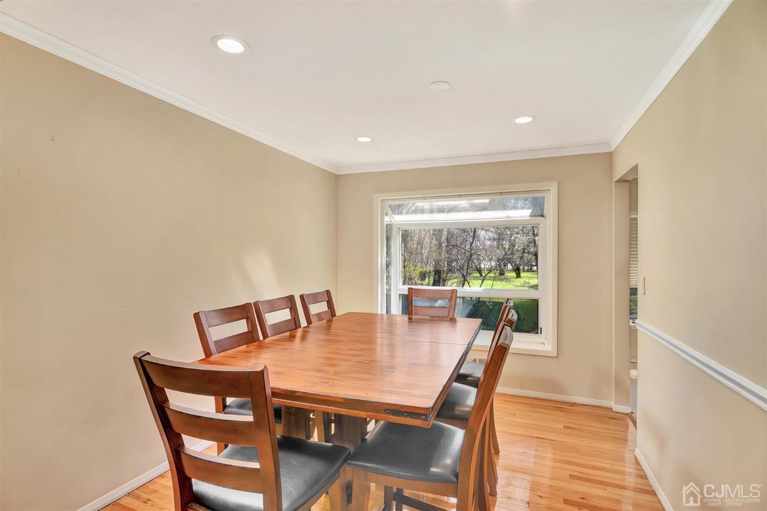 8 Innes Road East Brunswick, NJ 08816 - Photo 9 of 32 a dining room with furniture window and outside view