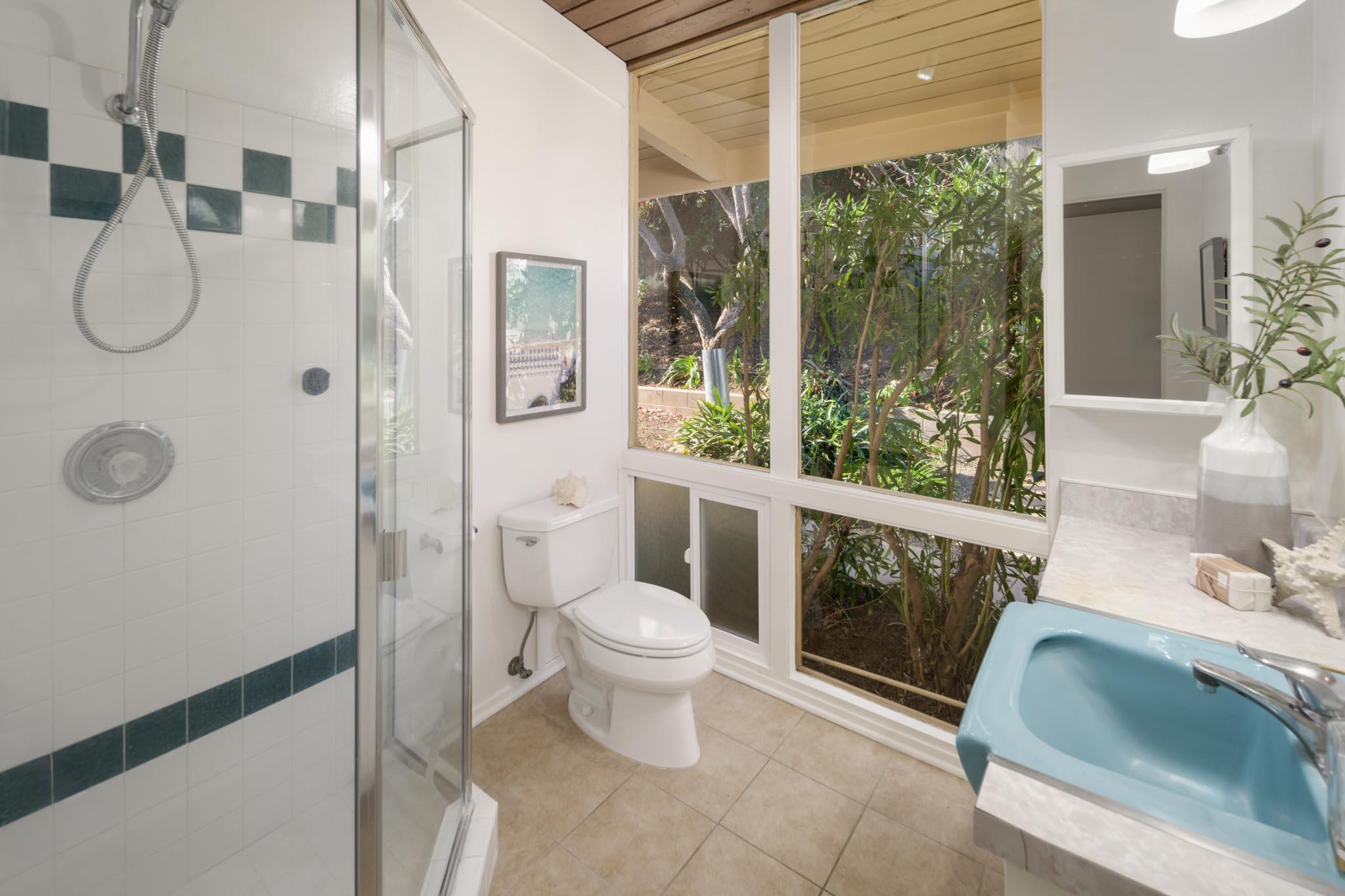 4840 Winding Way Santa Barbara, CA 93111 - Photo 13 of 22 a bathroom with a sink toilet and shower