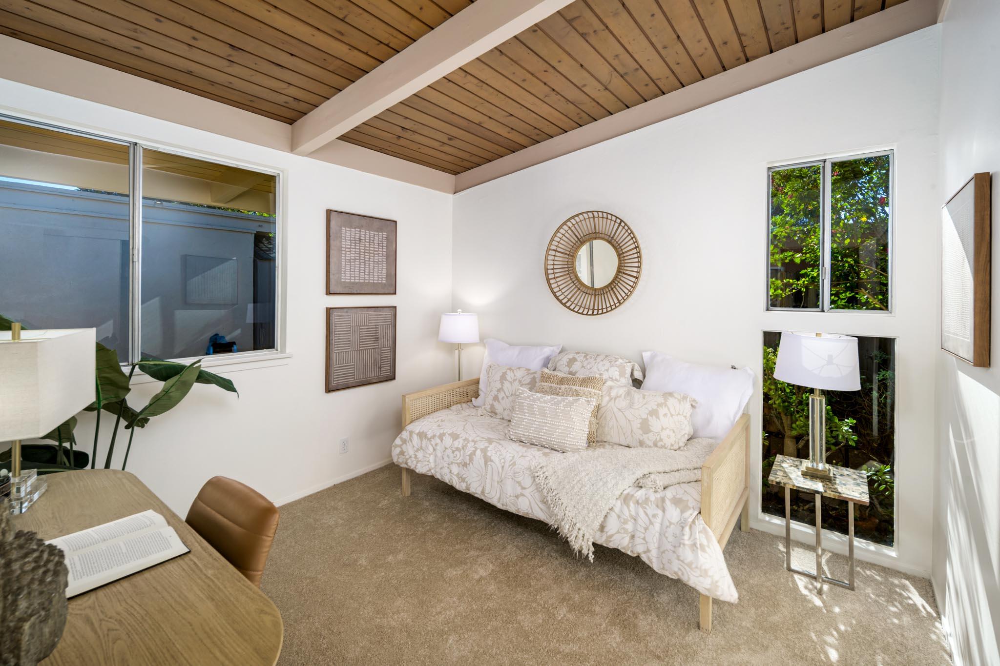 4840 Winding Way Santa Barbara, CA 93111 - Photo 15 of 22 a bedroom with bed and a large window