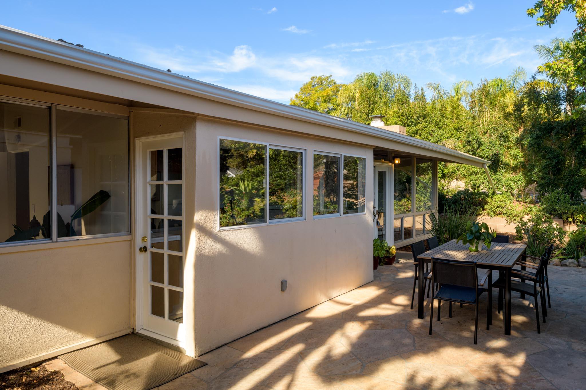 4840 Winding Way Santa Barbara, CA 93111 - Photo 20 of 22 a view of a patio with table and chairs and potted plants