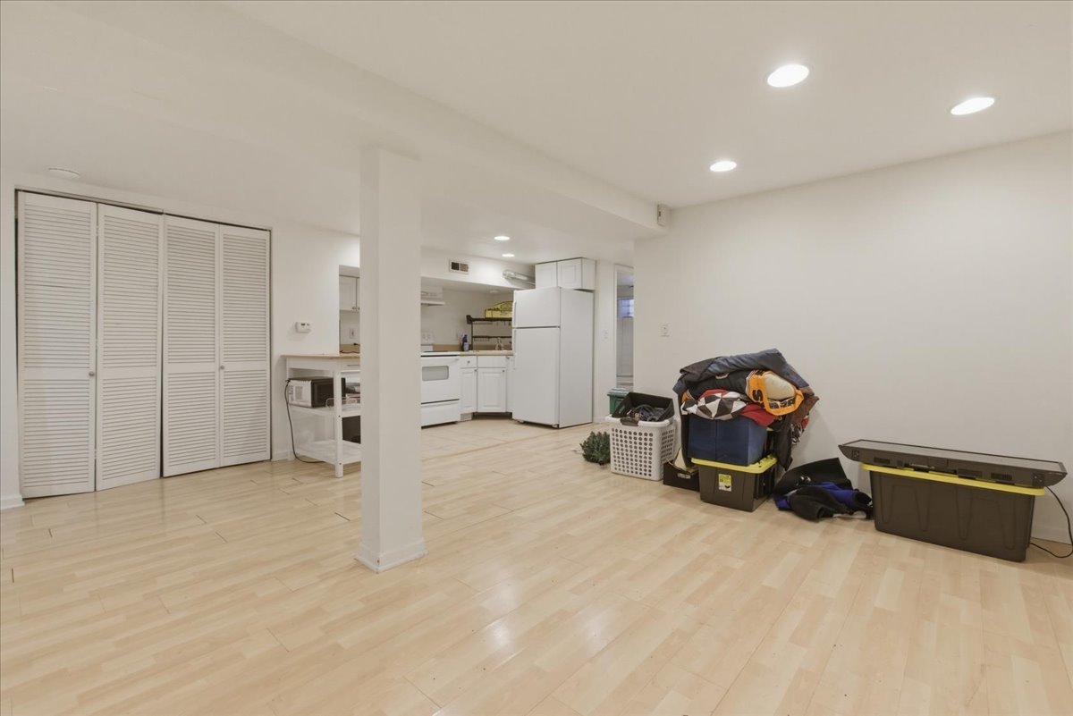 3716 North Wayne Avenue, Unit GR Chicago, IL 60613 - Photo 7 of 10 a view of a storage & utility room with furniture