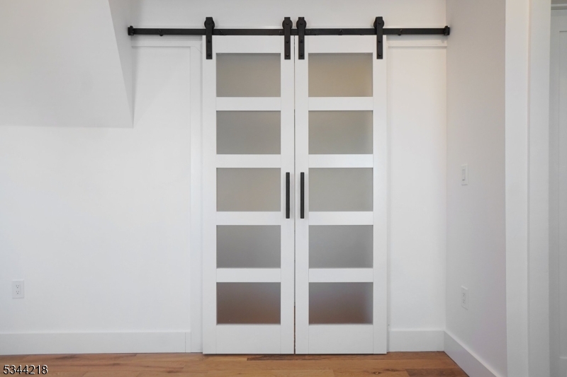 51 New Street, Unit B Montclair, NJ 07042 - Photo 13 of 32 a view of walk in closet with empty racks