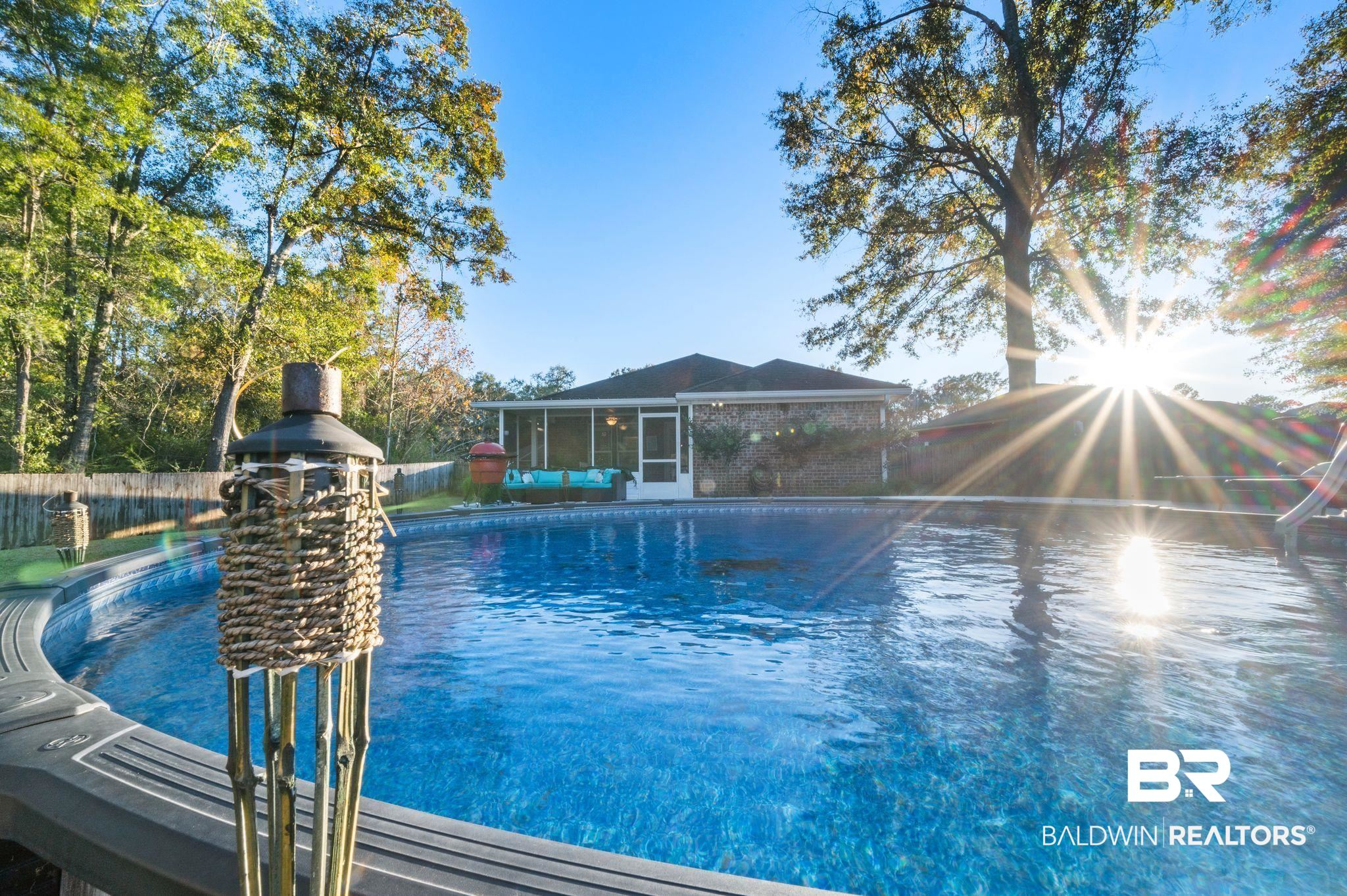 9366 Fox Run Court Semmes, AL 36575 - Photo 23 of 29 View of pool with a sunroom