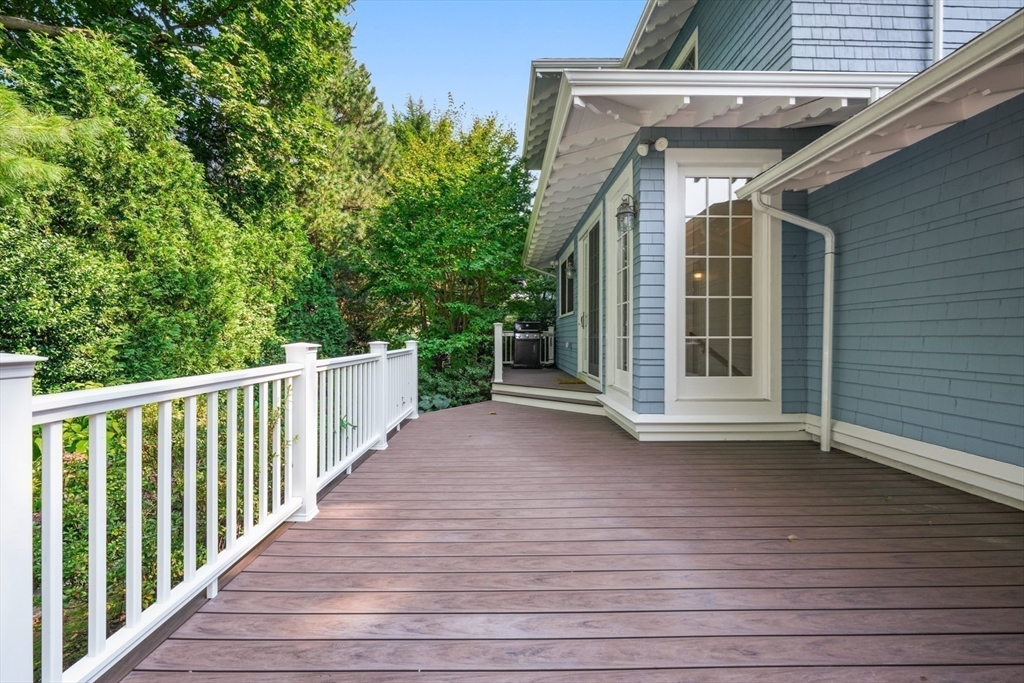 85 Williston Road Brookline, MA 02445 - Photo 23 of 29 a view of a deck with wooden floor and fence
