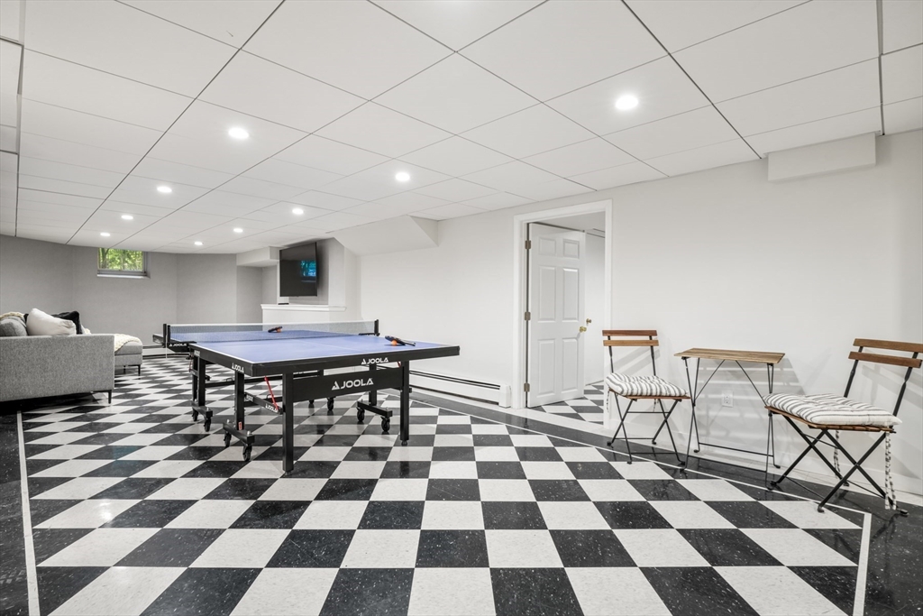 85 Williston Road Brookline, MA 02445 - Photo 29 of 29 a room with a black white checkered floor with a black white checkered floor