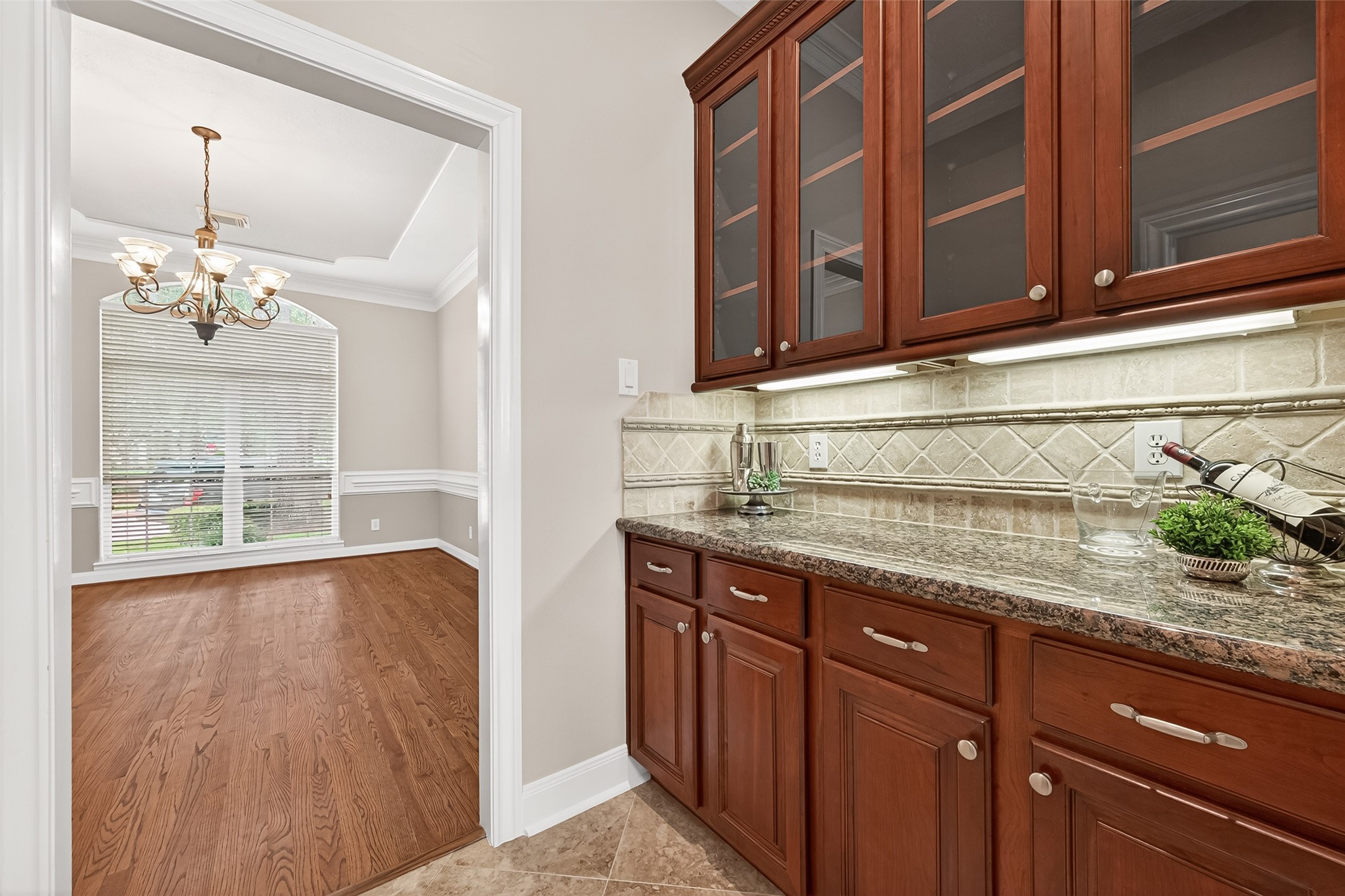 4203 Deforest Ridge Circle Katy, TX 77494 - Photo 12 of 50 Butlers pantry between the formal dining room and the kitchen