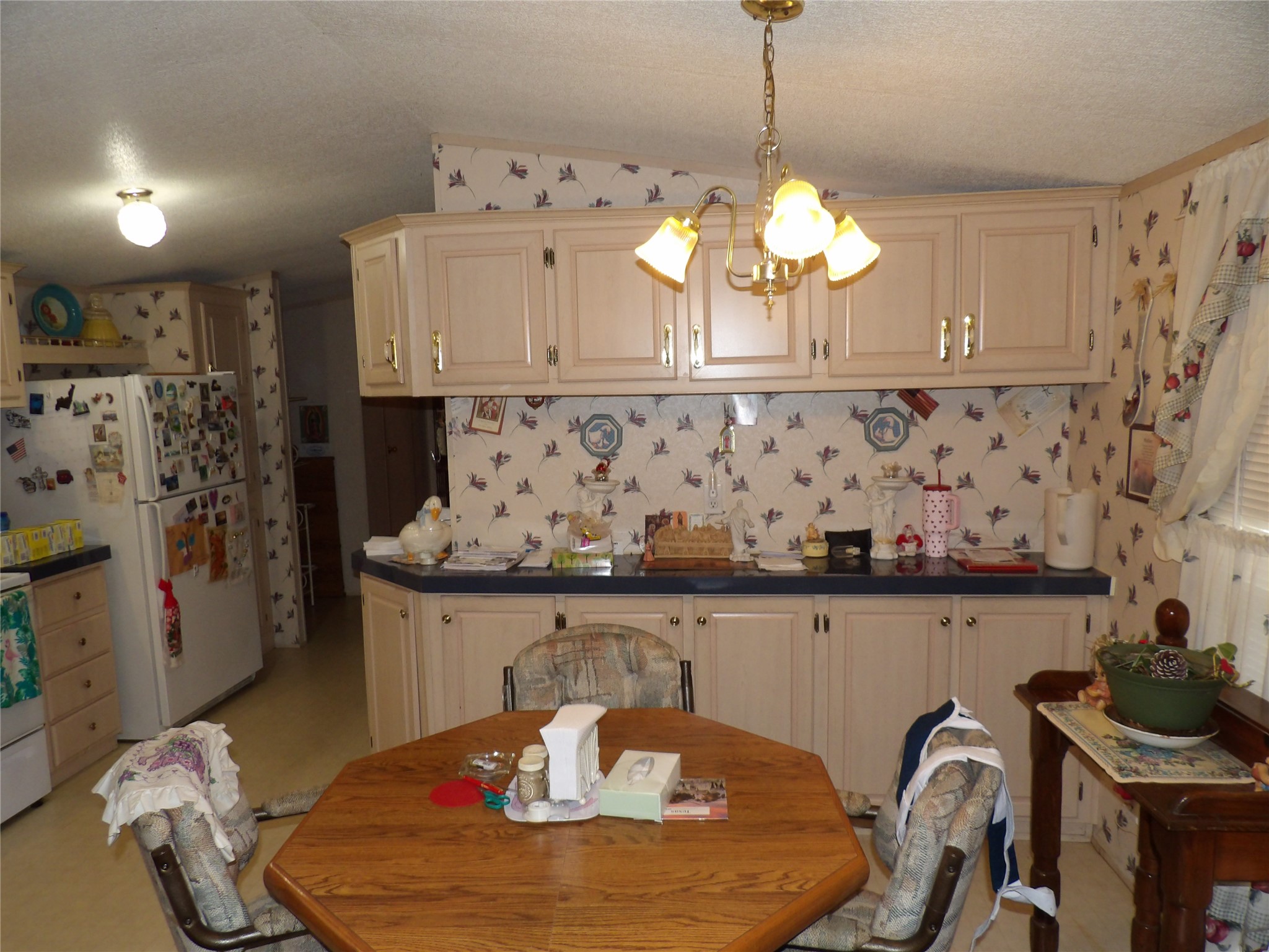 4748 County Road 3220 Kempner, TX 76539 - Photo 3 of 17 a kitchen with a table and chairs