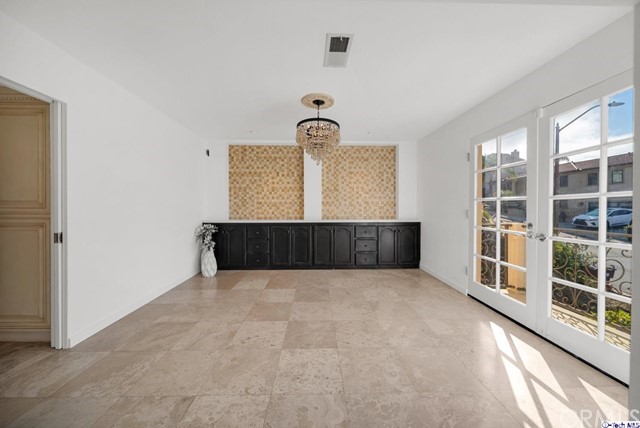 2026 Rimcrest Drive Glendale, CA 91207 - Photo 13 of 44 a view of an empty room with window and cabinet