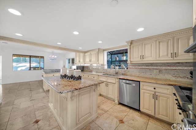 2026 Rimcrest Drive Glendale, CA 91207 - Photo 15 of 44 a kitchen with sink stove and cabinets