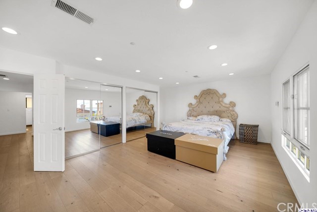 2026 Rimcrest Drive Glendale, CA 91207 - Photo 20 of 44 a living room with furniture and a flat screen tv