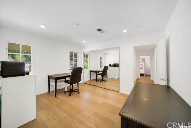 2026 Rimcrest Drive Glendale, CA 91207 - Photo 27 of 44 a living room with furniture and a flat screen tv