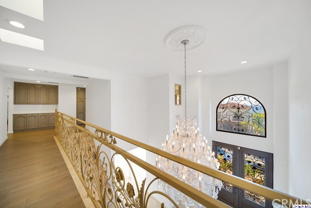 2026 Rimcrest Drive Glendale, CA 91207 - Photo 31 of 44 a view of an entryway with wooden floor