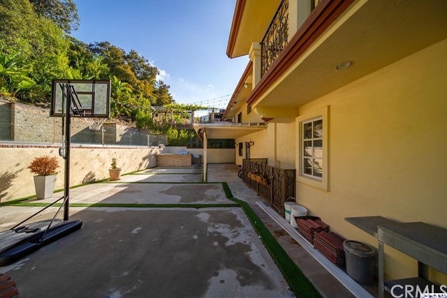 2026 Rimcrest Drive Glendale, CA 91207 - Photo 37 of 44 a view of a porch with furniture