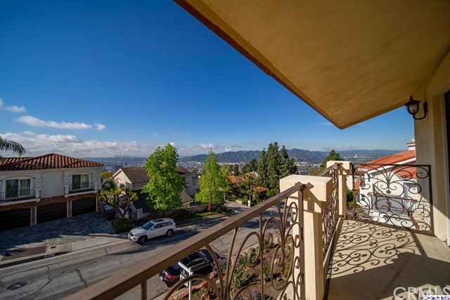 2026 Rimcrest Drive Glendale, CA 91207 - Photo 40 of 44 a view of balcony with wooden floor