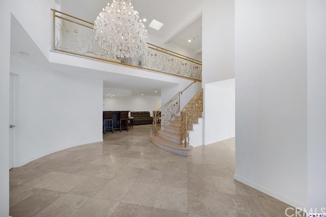 2026 Rimcrest Drive Glendale, CA 91207 - Photo 6 of 44 a view of a hallway view with staircase